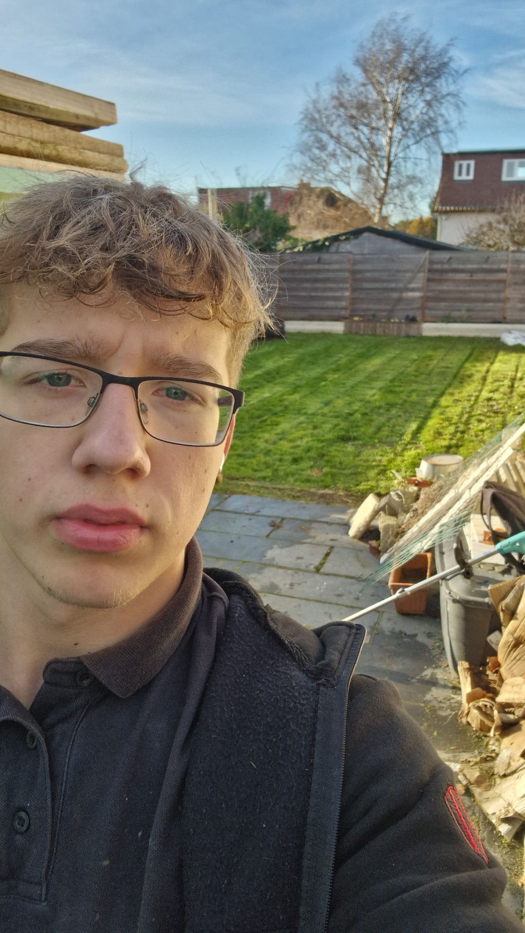 Evaldas, founder of ELawnCare, who carries out every job personally across Cambridge